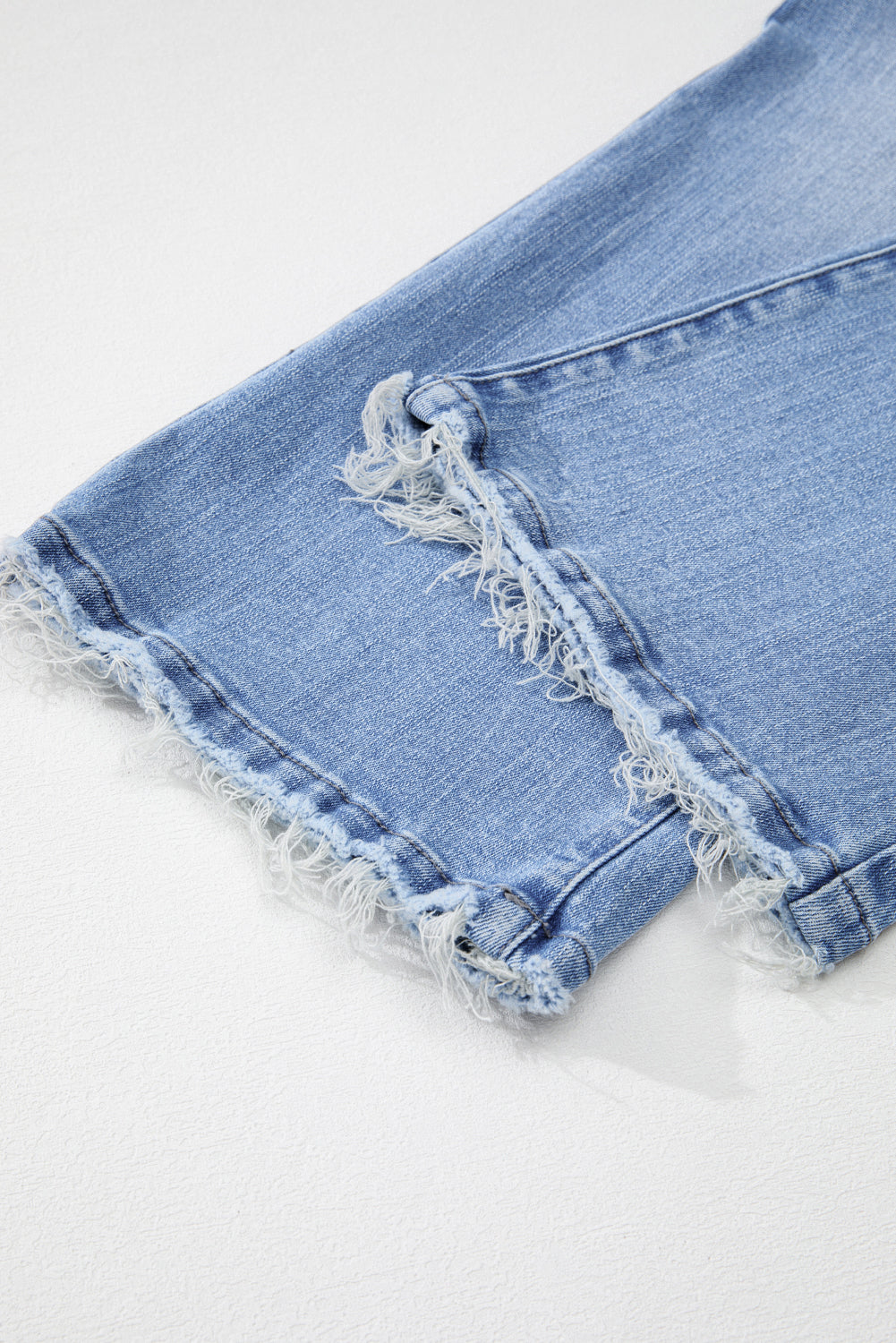 Raw Hem High Waist Flared Jeans in Light, Medium, & Dark Washes